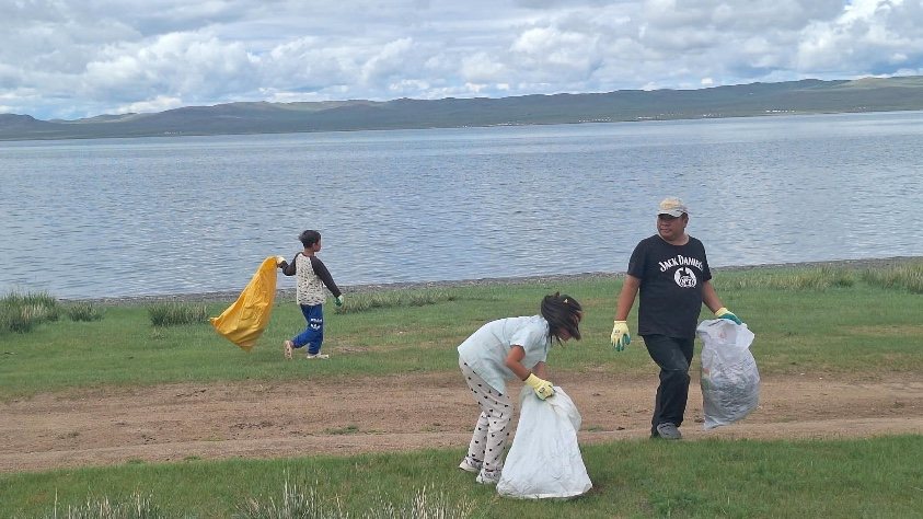 Collect: Waste is gathered from the lake shore and the tourist camps and loaded for transport.